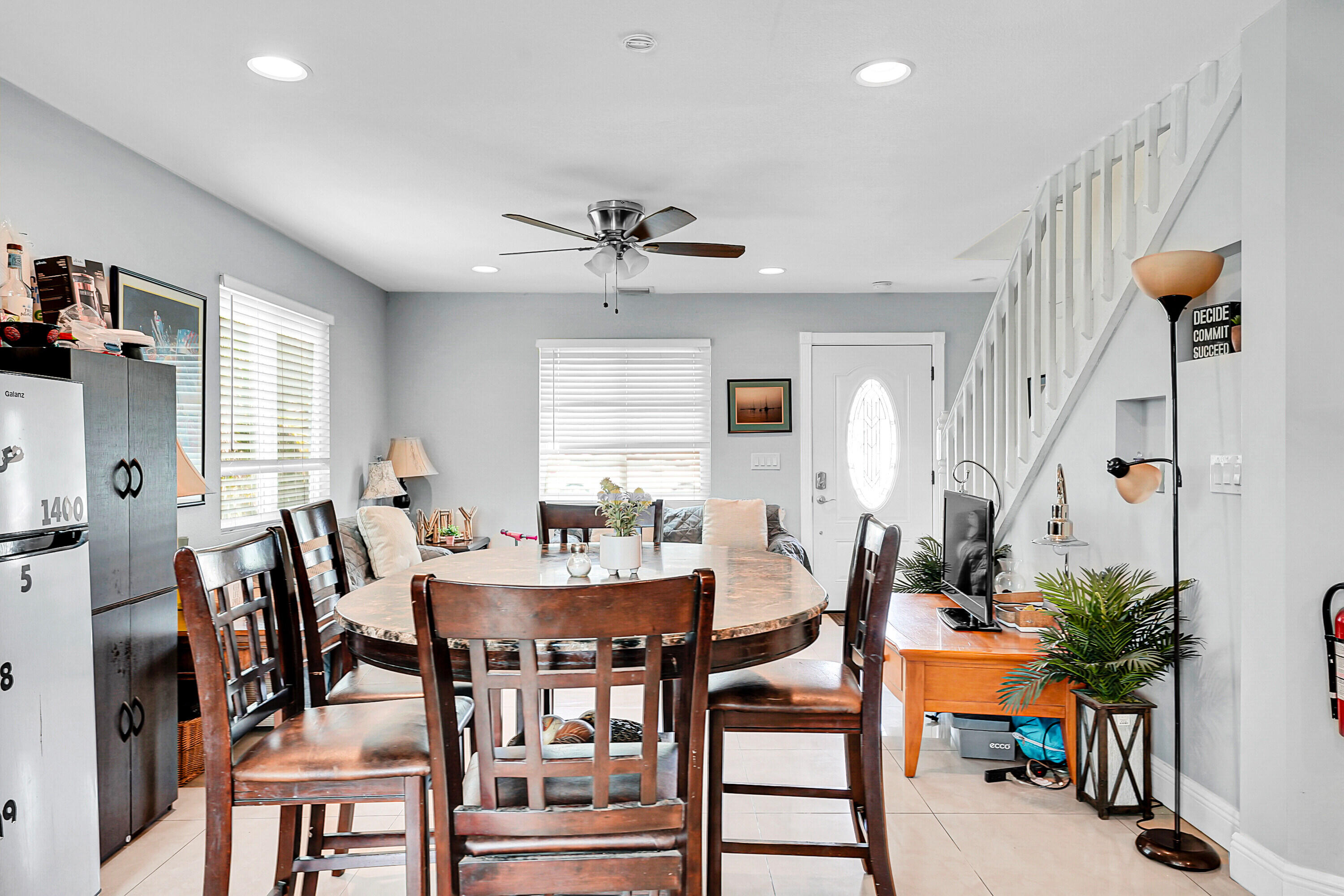 2856 Harson Way Fort Pierce, FL 34946 - Photo 13 of 37 a view of a a dining room with furniture window and wooden floor
