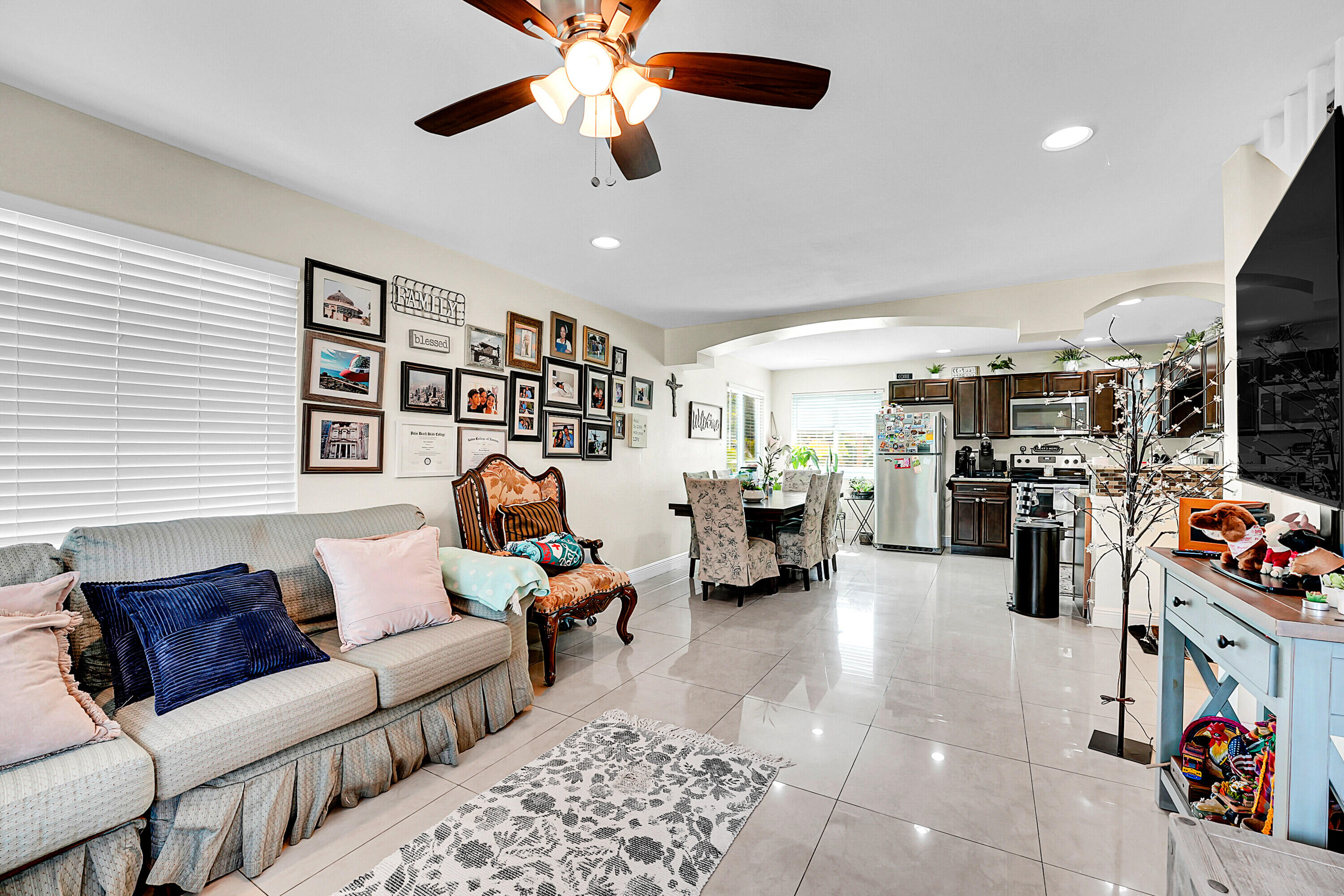 2856 Harson Way Fort Pierce, FL 34946 - Photo 20 of 37 a living room with furniture kitchen view and a window