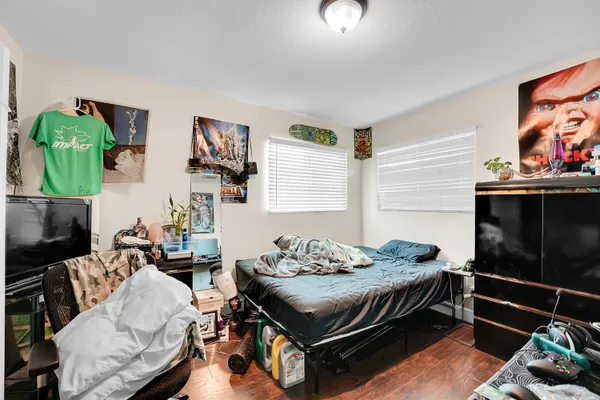 a bedroom with furniture and a bed