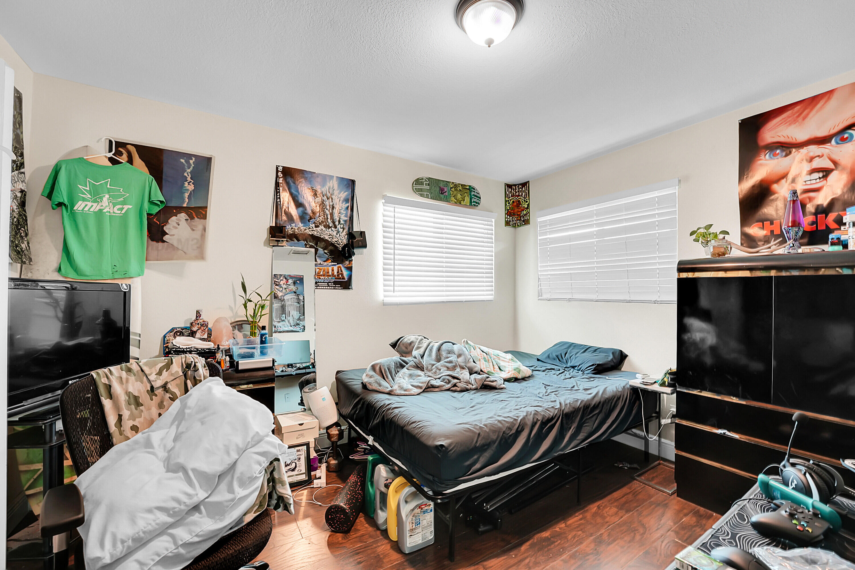 2856 Harson Way Fort Pierce, FL 34946 - Photo 26 of 37 a bedroom with furniture and a bed