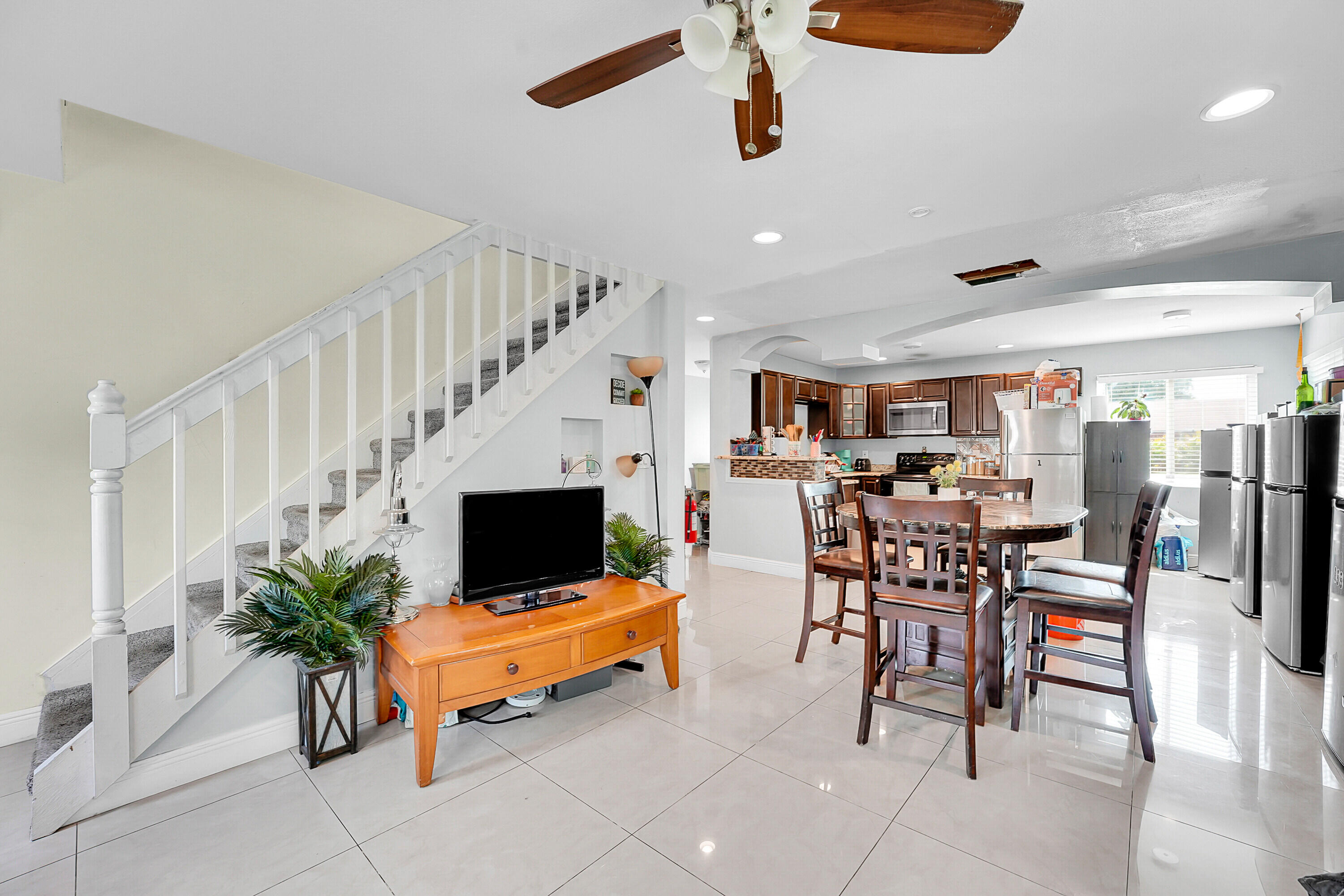 2856 Harson Way Fort Pierce, FL 34946 - Photo 32 of 37 a living room with furniture and a flat screen tv