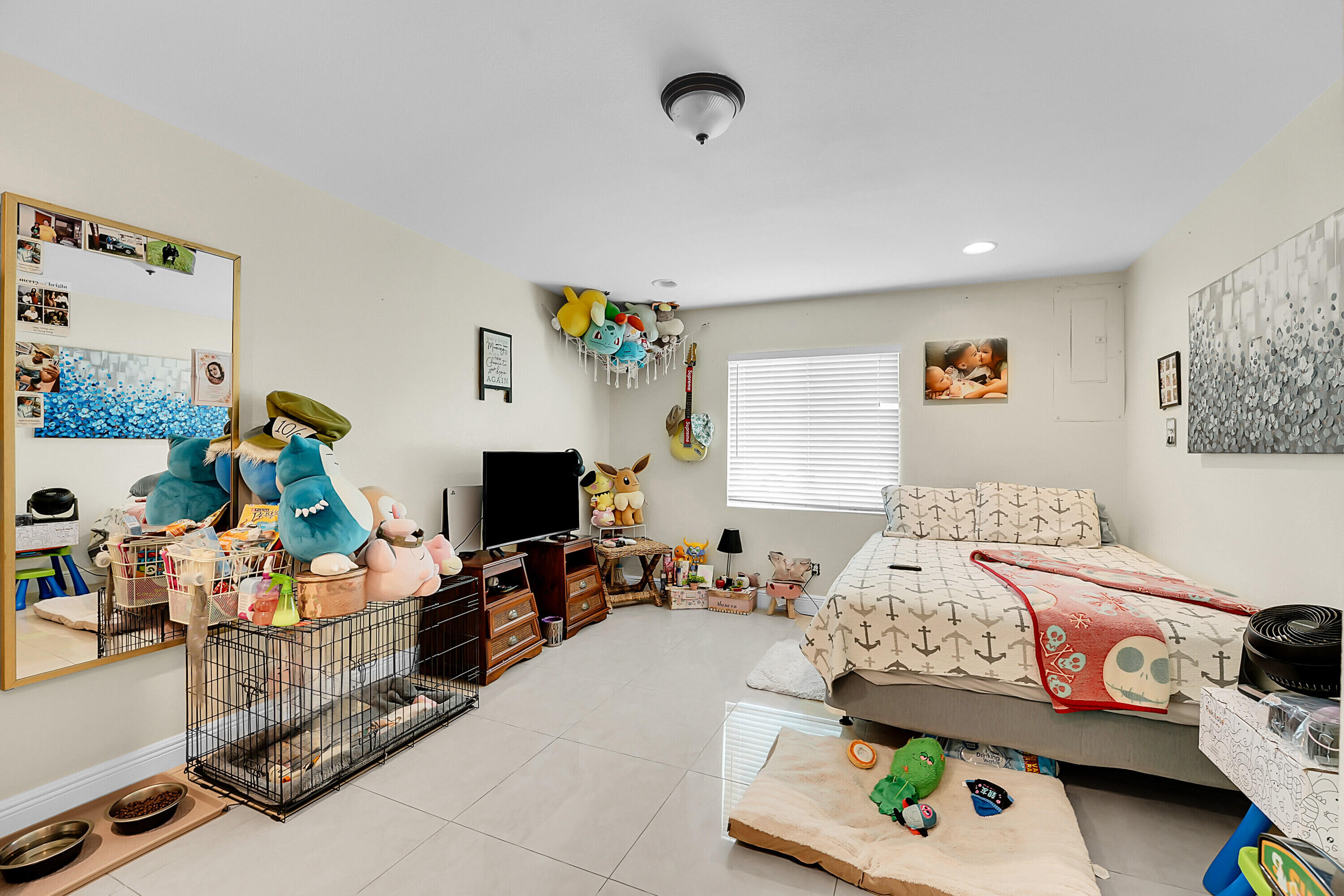 2856 Harson Way Fort Pierce, FL 34946 - Photo 35 of 37 a bedroom with furniture and a wooden floor