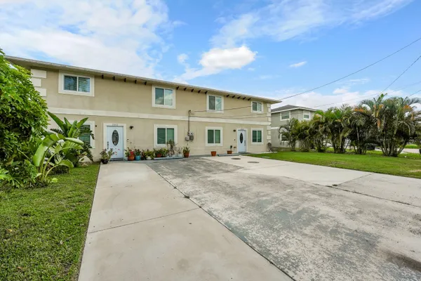 a view of a building with a garden