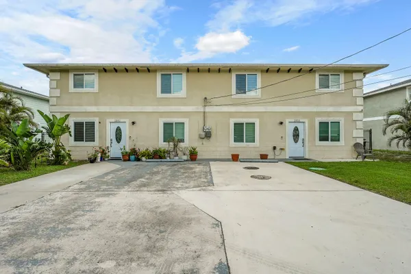 front view of house with a yard
