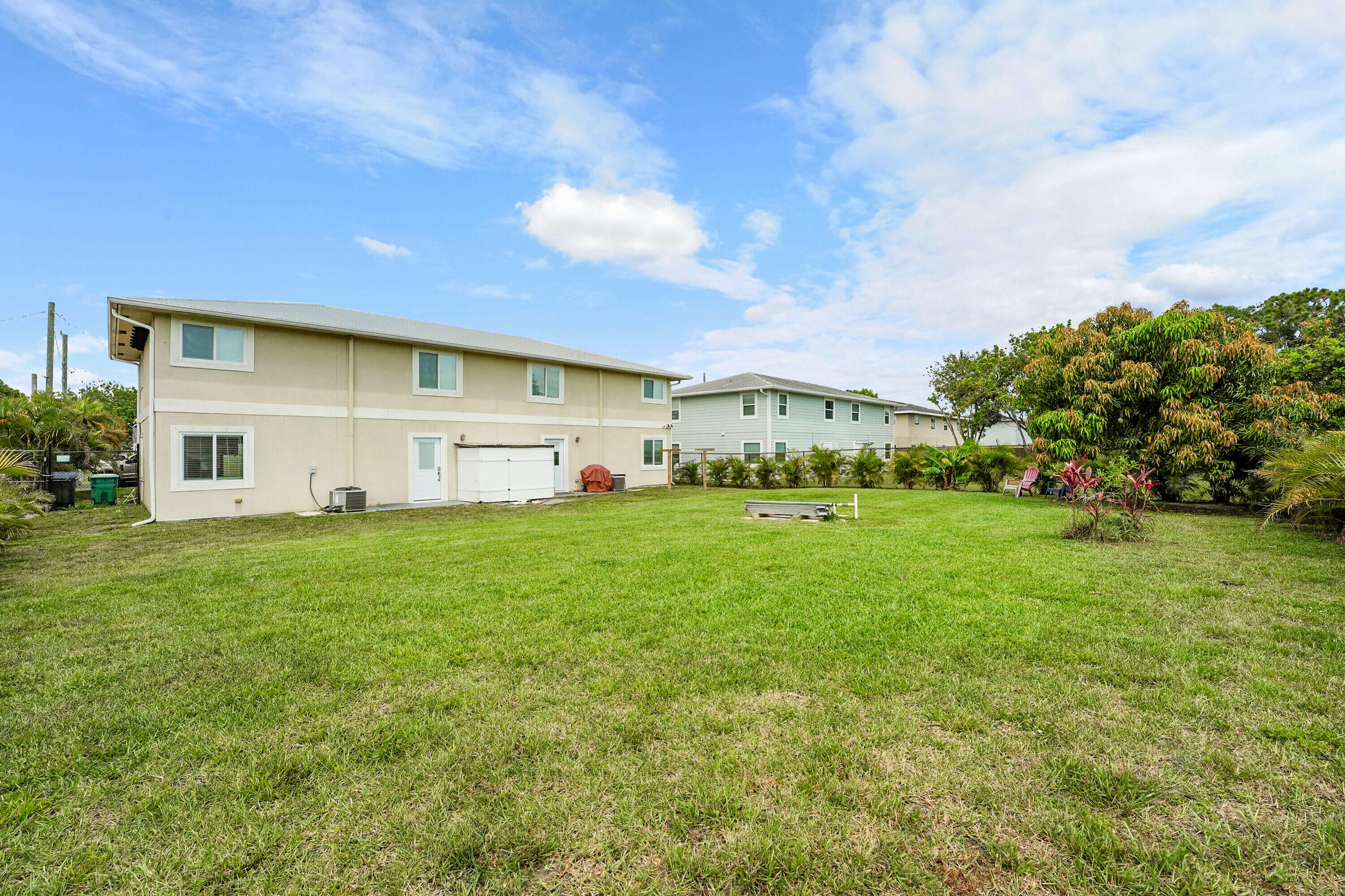 2856 Harson Way Fort Pierce, FL 34946 - Photo 7 of 37 a view of an house with backyard space and garden