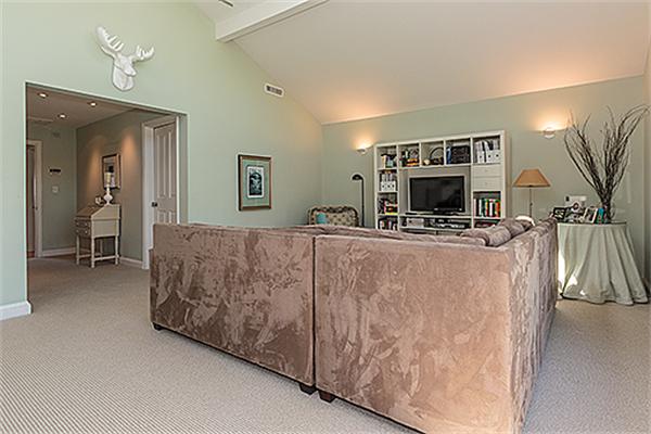 15 Trinity Road Winchester, MA 01890 - Photo 9 of 29 a living room with furniture and a fireplace