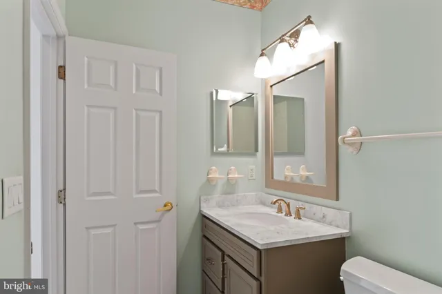 a view of a porch with wooden floor and outdoor space