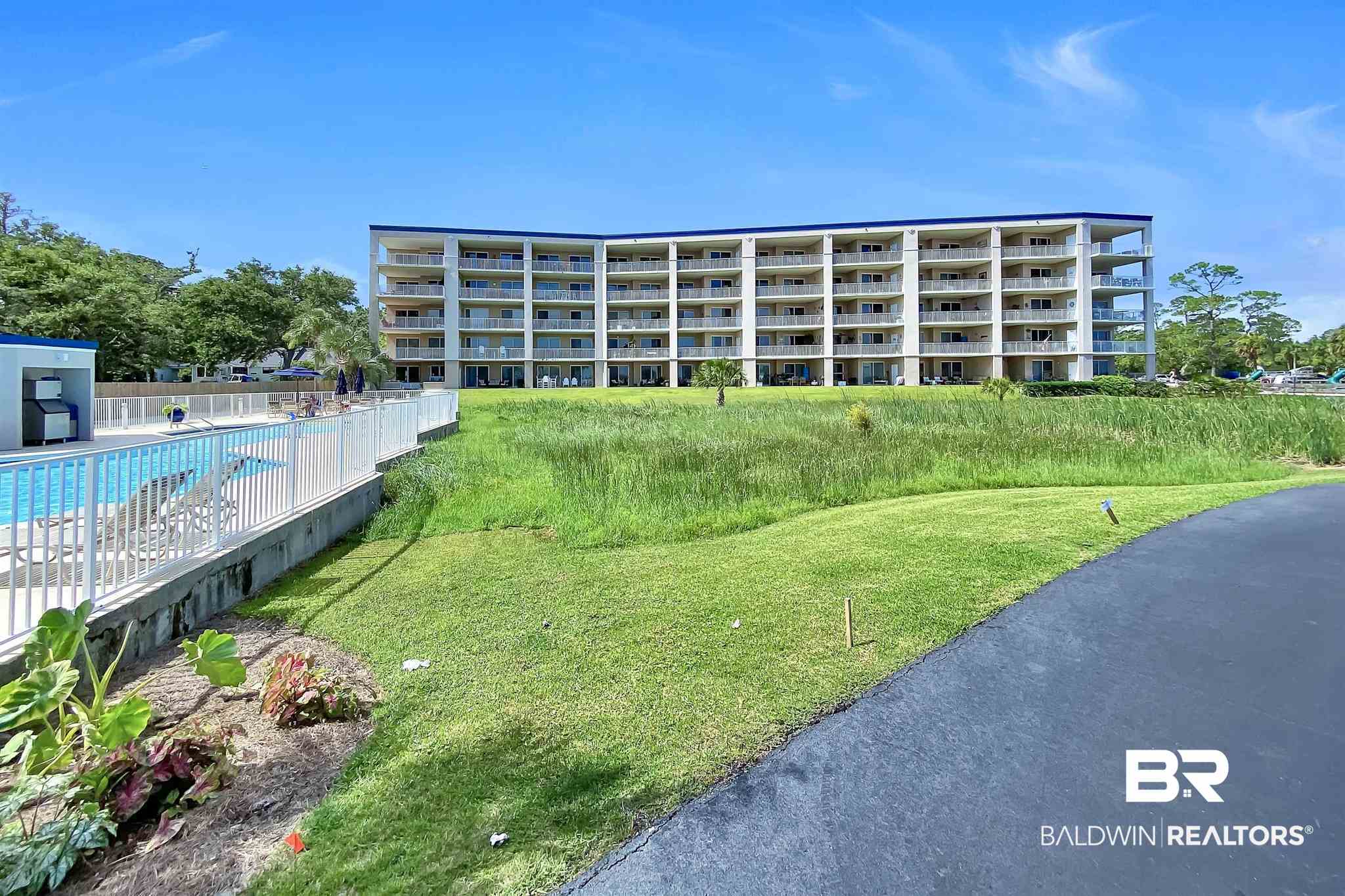 27282 Canal Road, Unit 112 Orange Beach, AL 36561 - Photo 33 of 47 Grassy Lawn