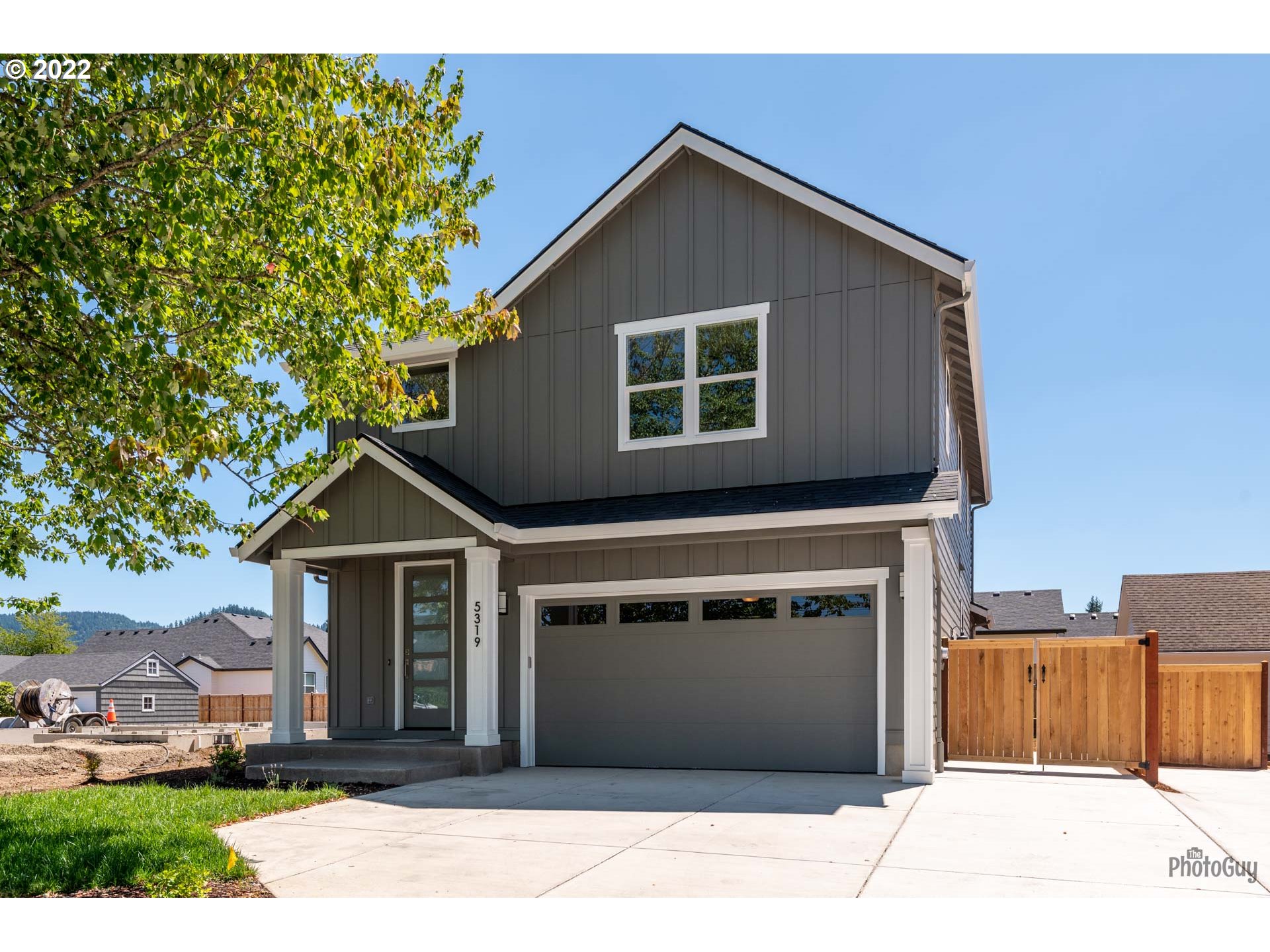 5319 High Banks Road Springfield, OR 97478 - Photo 1 of 32 a front view of a house with a garage