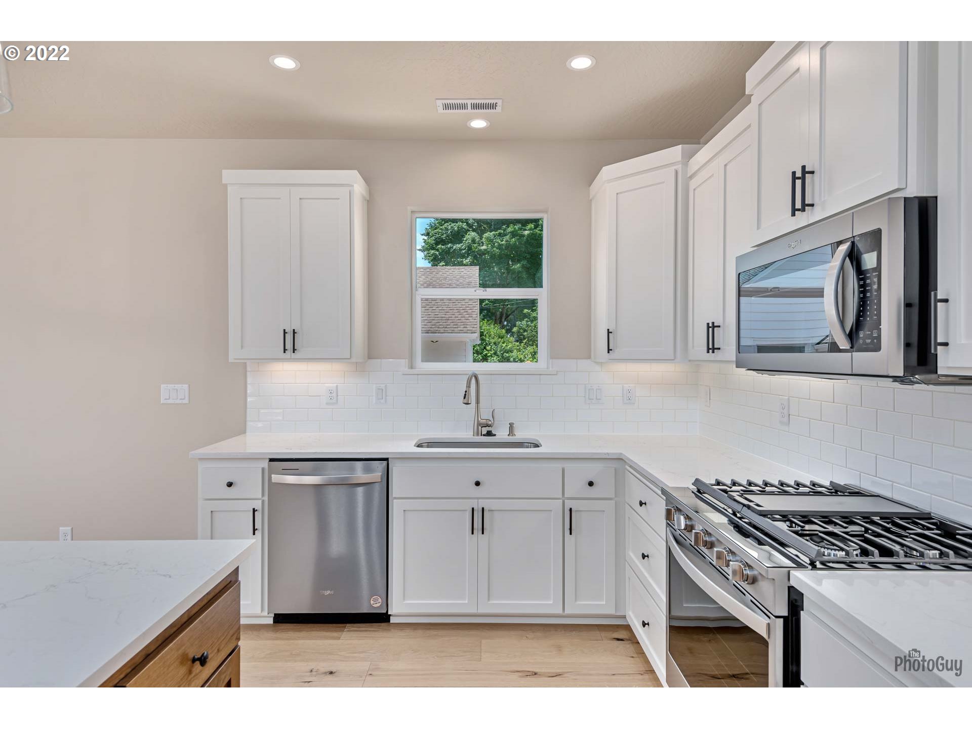 5319 High Banks Road Springfield, OR 97478 - Photo 12 of 32 a kitchen with cabinets stainless steel appliances and a sink