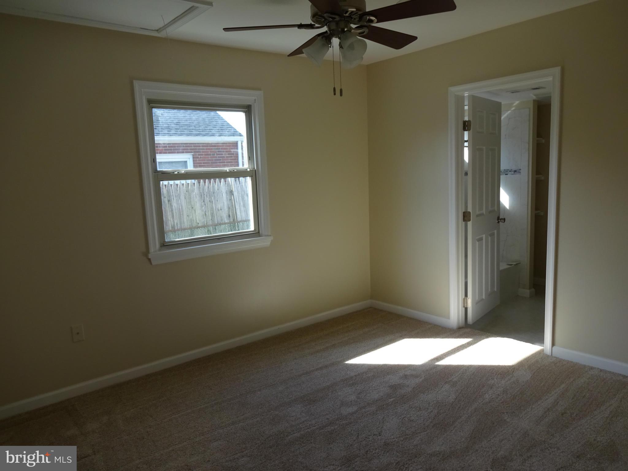 6 Chandelle Road Baltimore, MD 21220 - Photo 9 of 13 Master Bedroom w/ new carpeting, freshly painted
