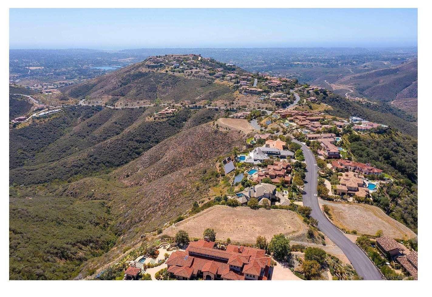 18347 Via Ambiente Rancho Santa Fe, CA 92067 - Photo 6 of 11 an aerial view of mountain with beach
