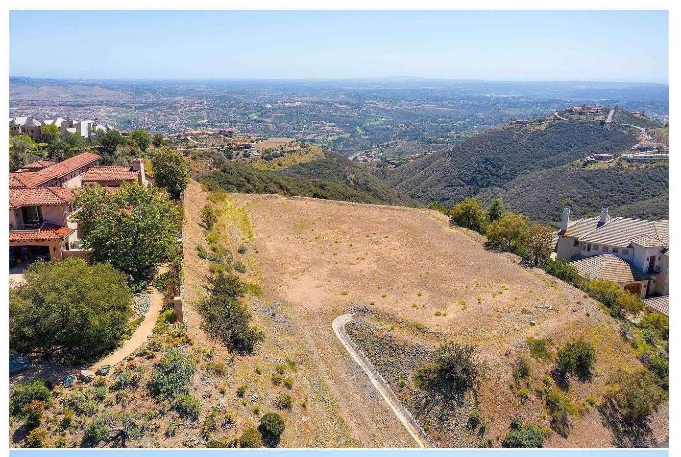 18347 Via Ambiente Rancho Santa Fe, CA 92067 - Photo 9 of 11 an aerial view of a house with a yard and mountain view in back