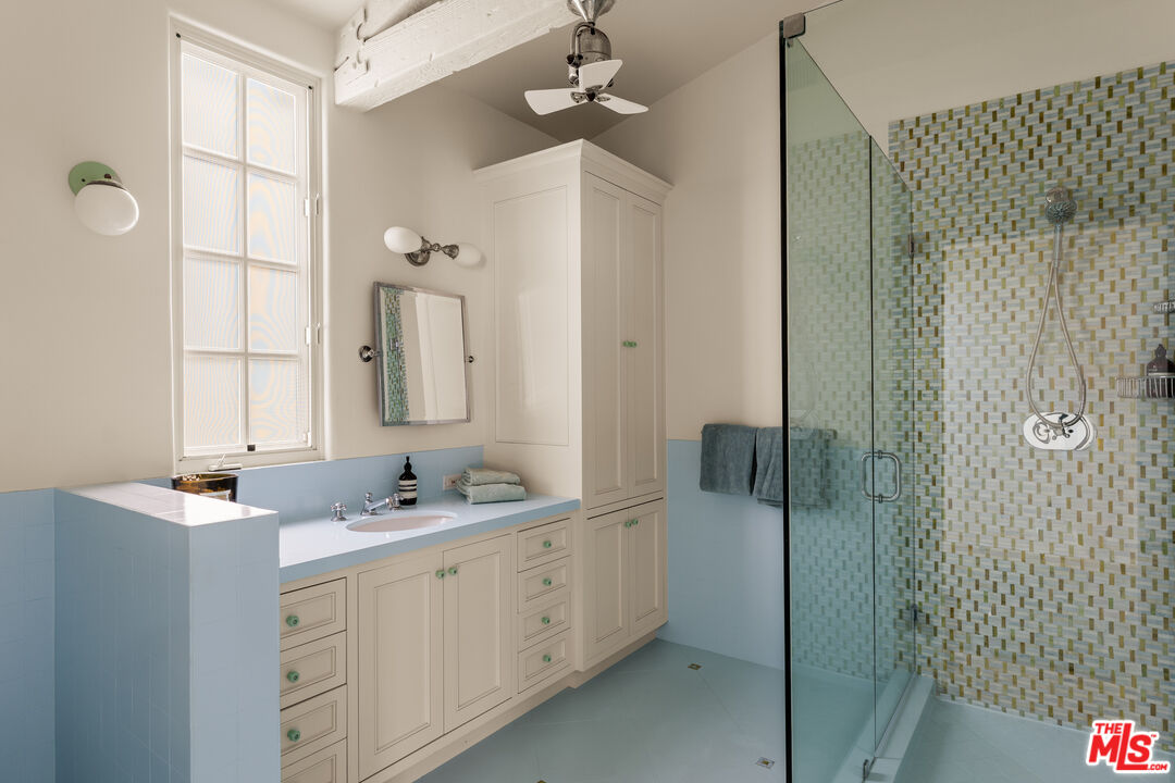 23422 Malibu Colony Road, Unit 98 Malibu, CA 90265 - Photo 14 of 42 a bathroom with a double vanity sink mirror and shower