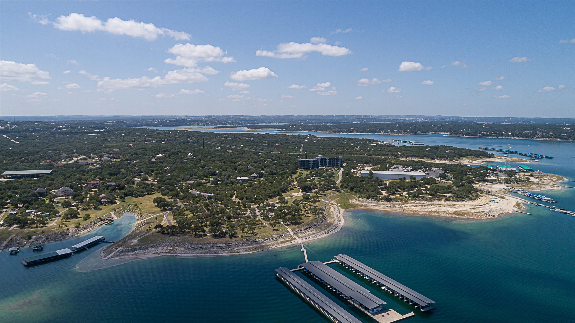 5921 Hiline Road, Unit 2403 Austin, TX 78734 - Photo 31 of 35 Aerial view above Lake Travis looking back towards South Shore Marina.