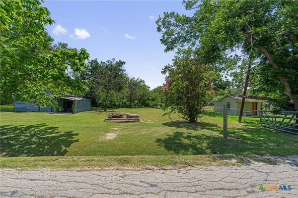 a view of a garden with a slide