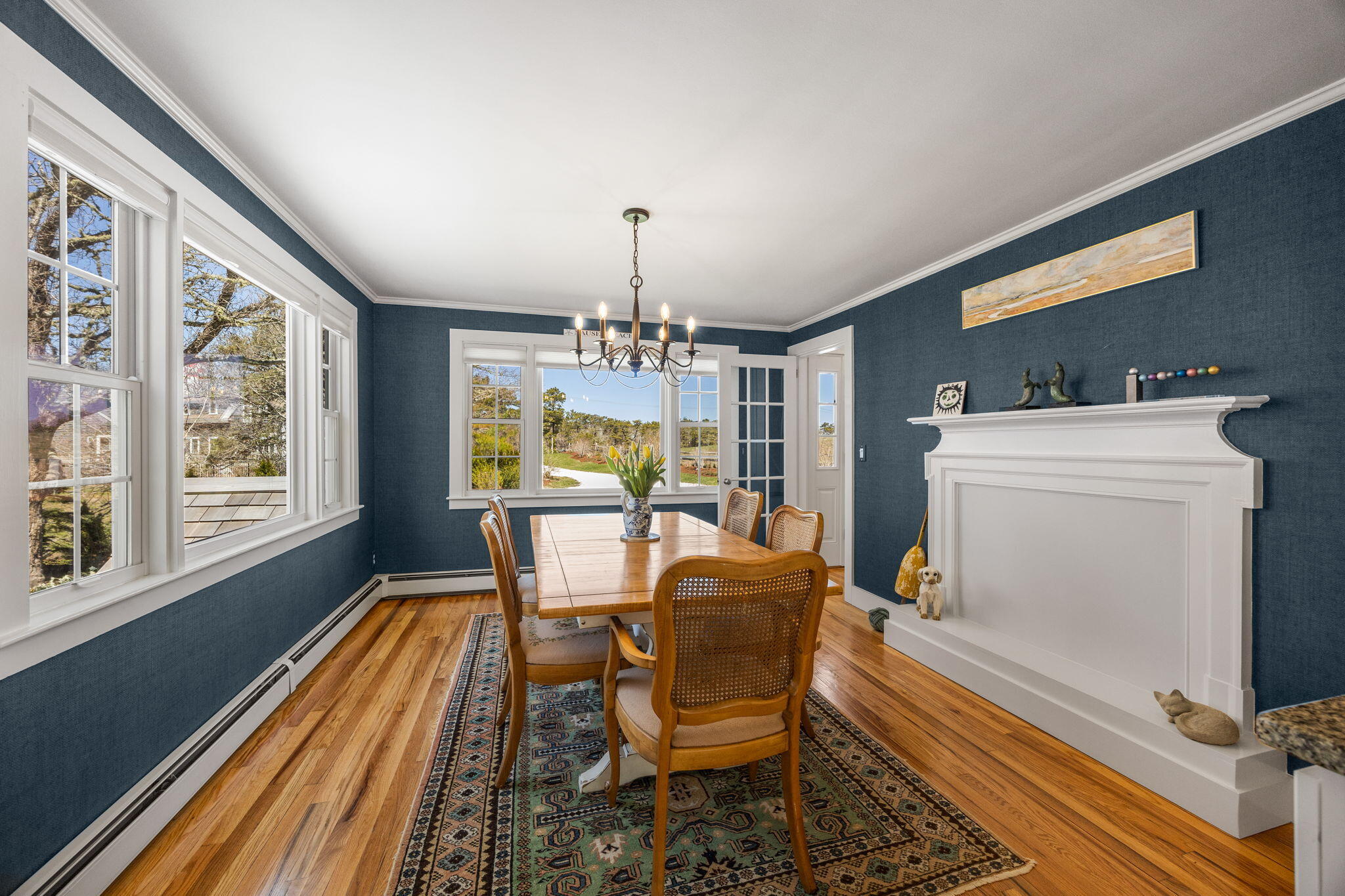 58 Stepping Stones Road Chatham, MA 02633 - Photo 11 of 52 a dining room with furniture a chandelier and wooden floor