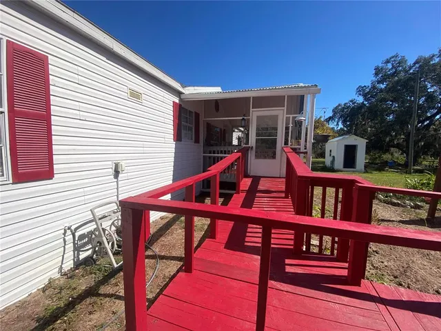 a kitchen with a sink stove and microwave