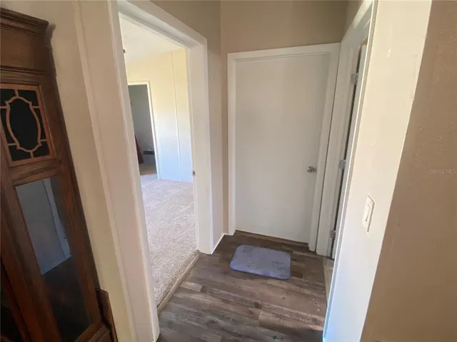 a view of an empty room and window