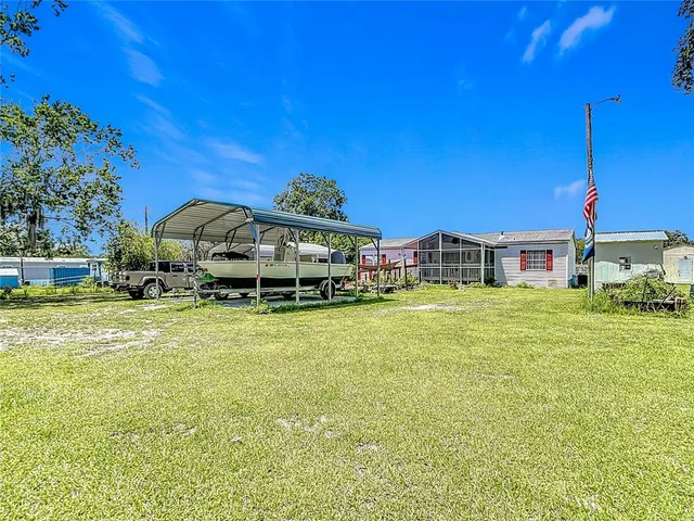 a room that has a bed and a table in it