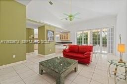 12982 Southwest 27th Street Miami, FL 33175 - Photo 11 of 43 a living room with furniture
