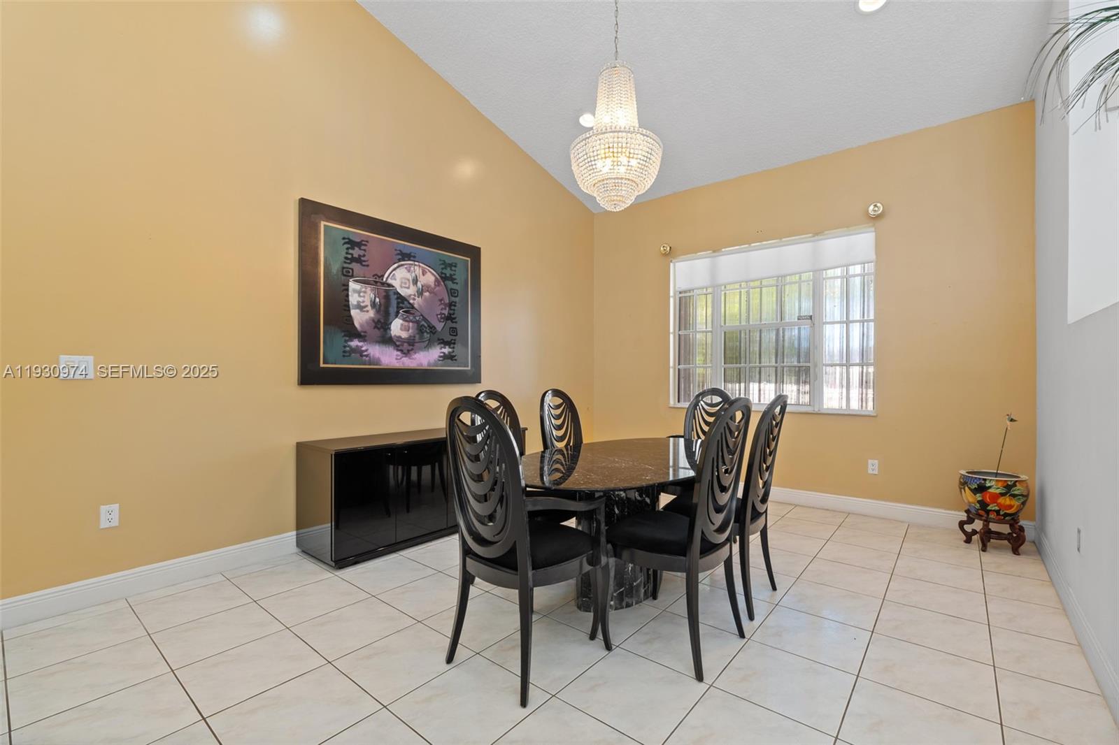 12982 Southwest 27th Street Miami, FL 33175 - Photo 20 of 43 a view of a dining room with furniture