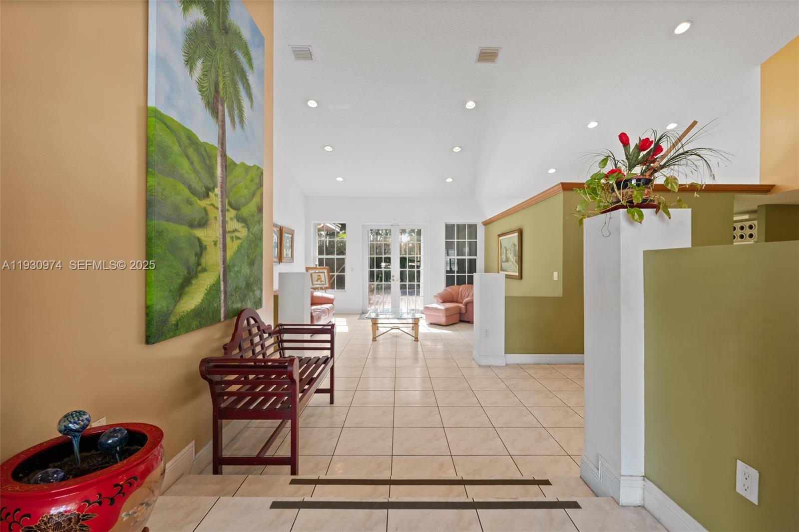 12982 Southwest 27th Street Miami, FL 33175 - Photo 23 of 43 a living room with furniture and a potted plant