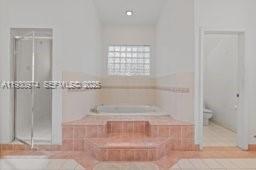 12982 Southwest 27th Street Miami, FL 33175 - Photo 32 of 43 a bathroom with a bathtub
