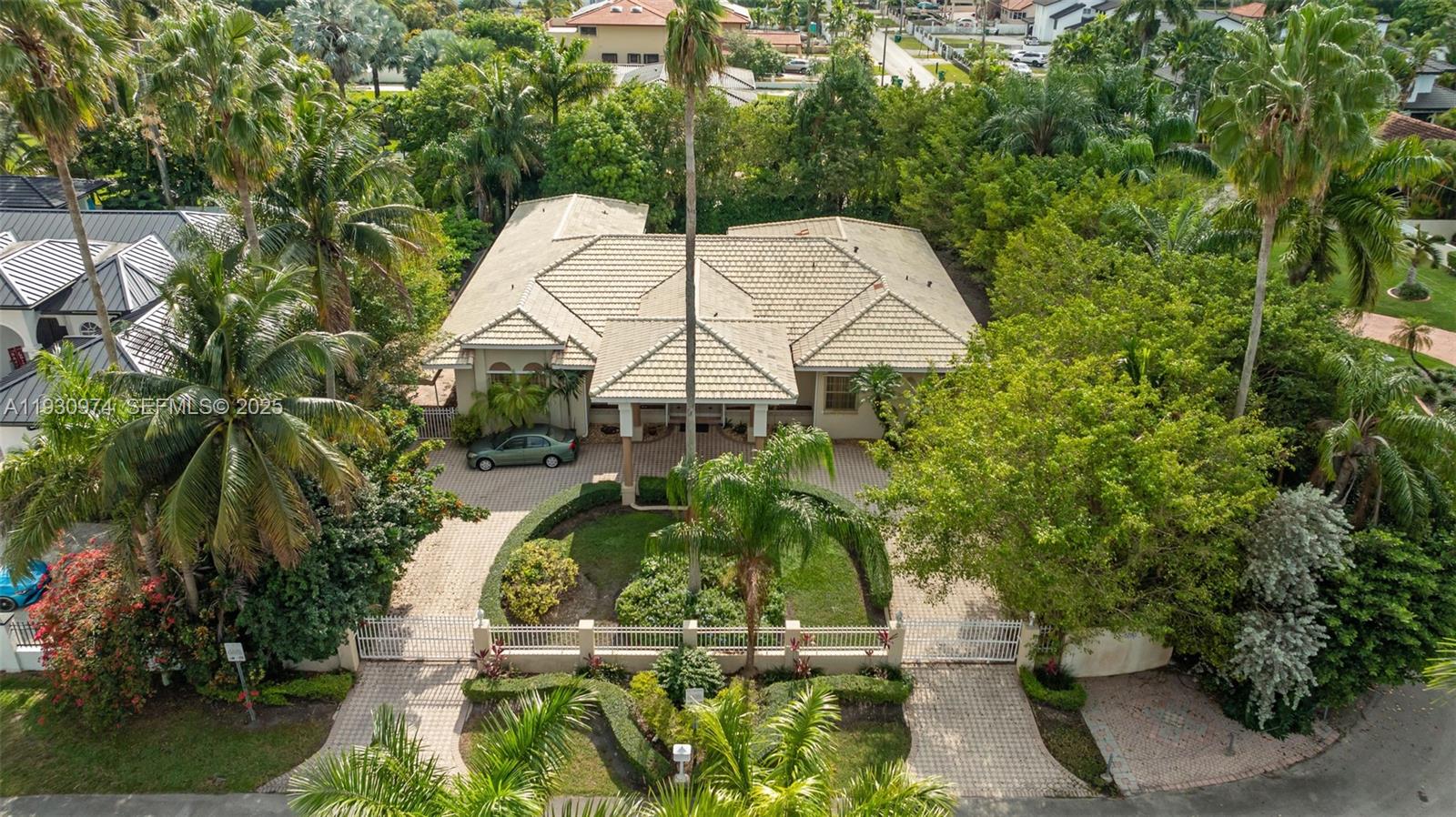 12982 Southwest 27th Street Miami, FL 33175 - Photo 6 of 43 an aerial view of a house with a yard basket ball court and outdoor seating