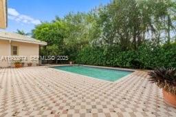 12982 Southwest 27th Street Miami, FL 33175 - Photo 8 of 43 a view of outdoor space and yard