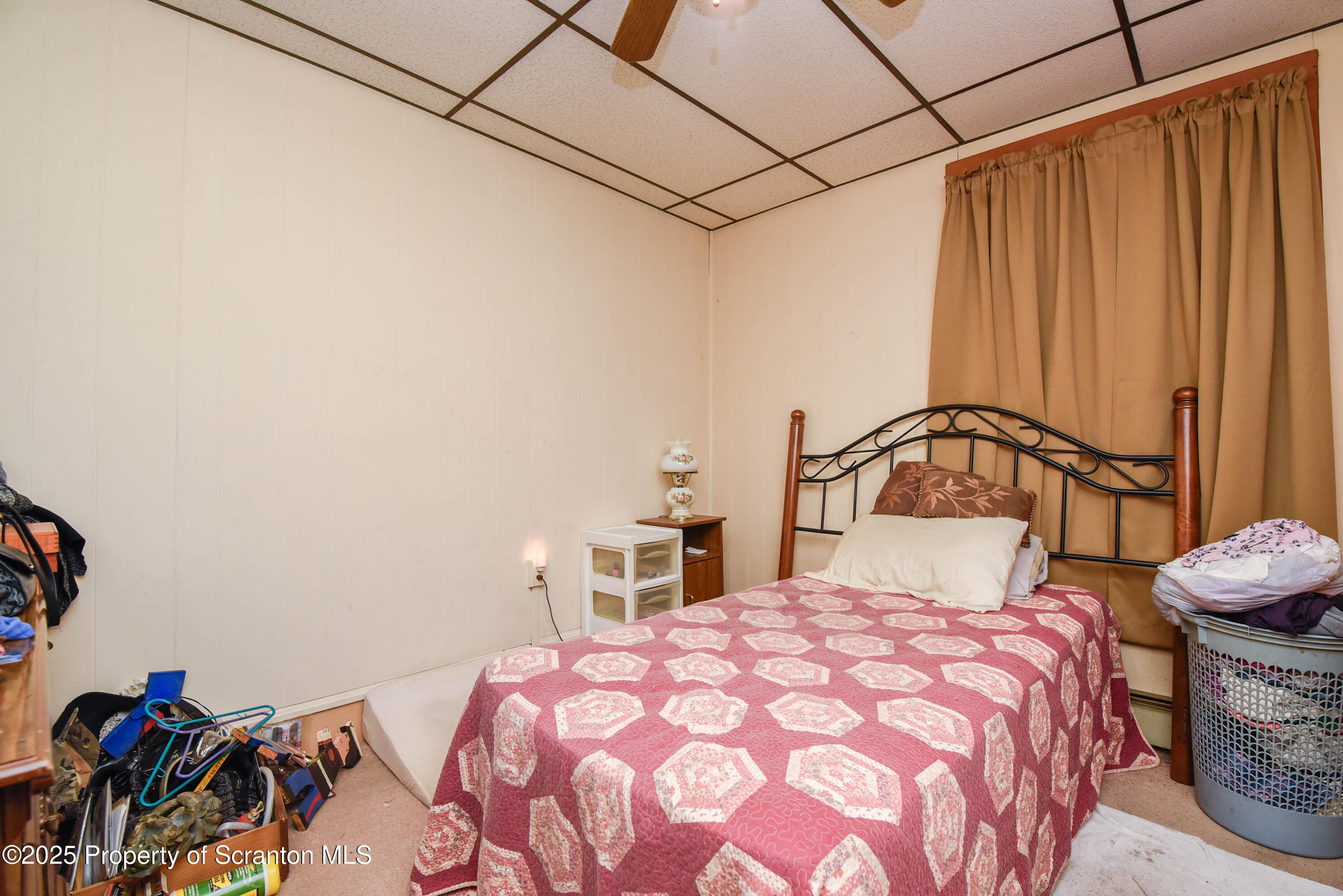 2706 North Main Avenue Scranton, PA 18508 - Photo 12 of 46 a bedroom with a bed and a painting on the wall