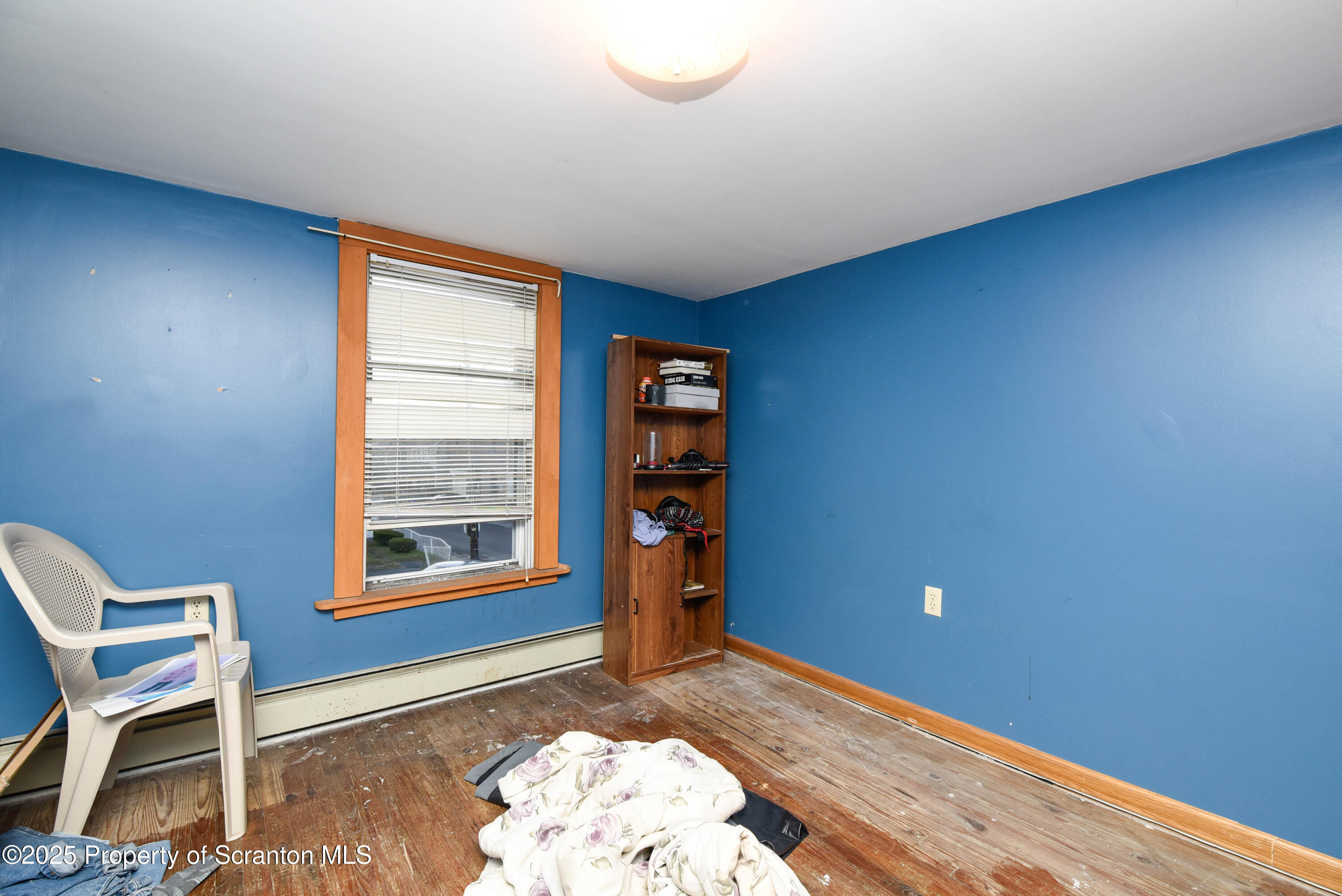 2706 North Main Avenue Scranton, PA 18508 - Photo 22 of 46 a view of a livingroom with wooden floor and a window
