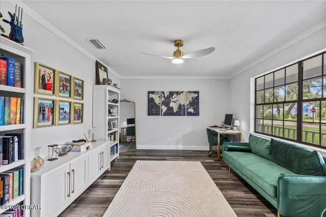 a bedroom with a bed and a book shelf