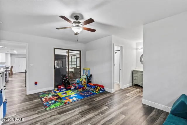 a bathroom with a granite countertop sink a mirror and vanity