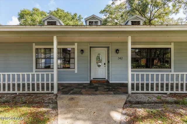 a view of a house with a porch