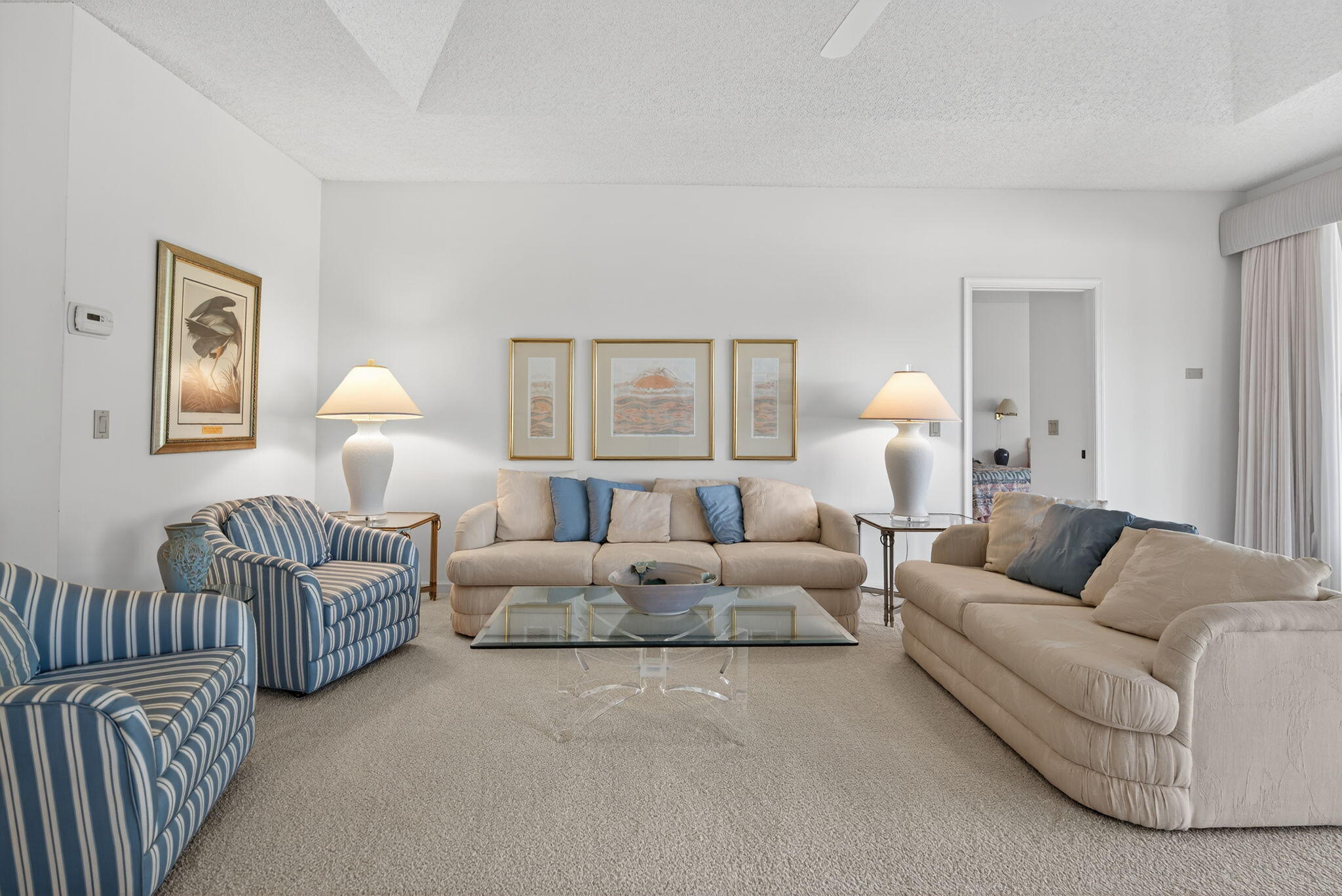 7036 Southeast Winged Foot Drive Stuart, FL 34997 - Photo 14 of 65 a living room with furniture