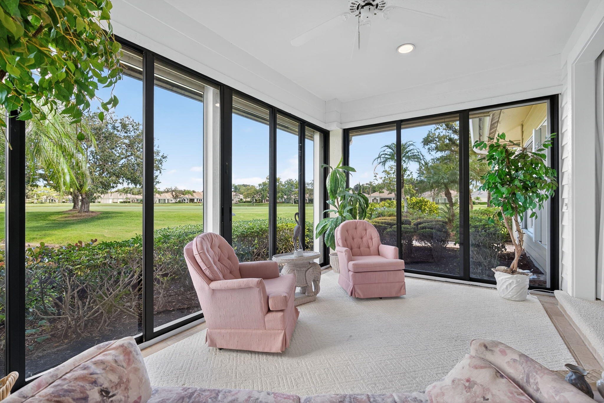 7036 Southeast Winged Foot Drive Stuart, FL 34997 - Photo 19 of 65 a balcony with furniture and garden view