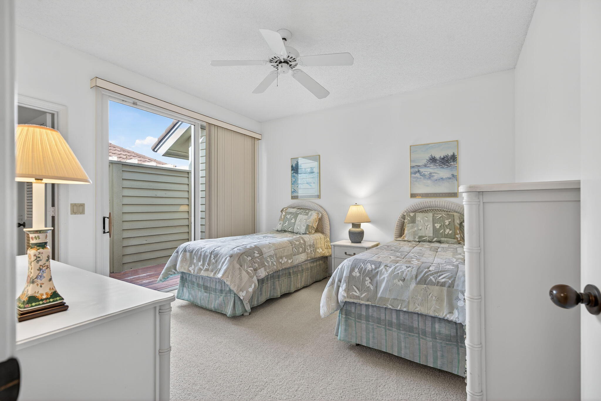 7036 Southeast Winged Foot Drive Stuart, FL 34997 - Photo 35 of 65 a bedroom with two beds and a table