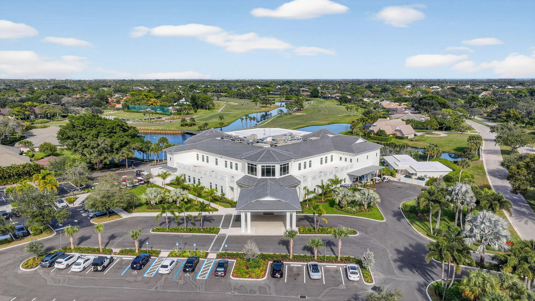 7036 Southeast Winged Foot Drive Stuart, FL 34997 - Photo 61 of 65 an aerial view of residential houses with outdoor space and street view