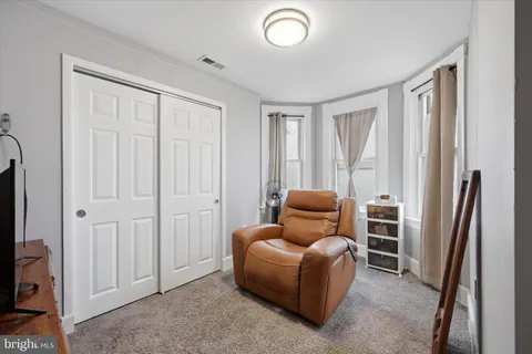a room with furniture and a window