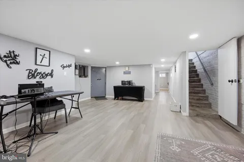 a view of kitchen with microwave and furniture