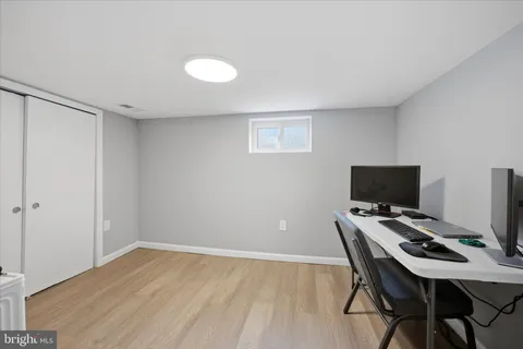 a view of a workspace with furniture