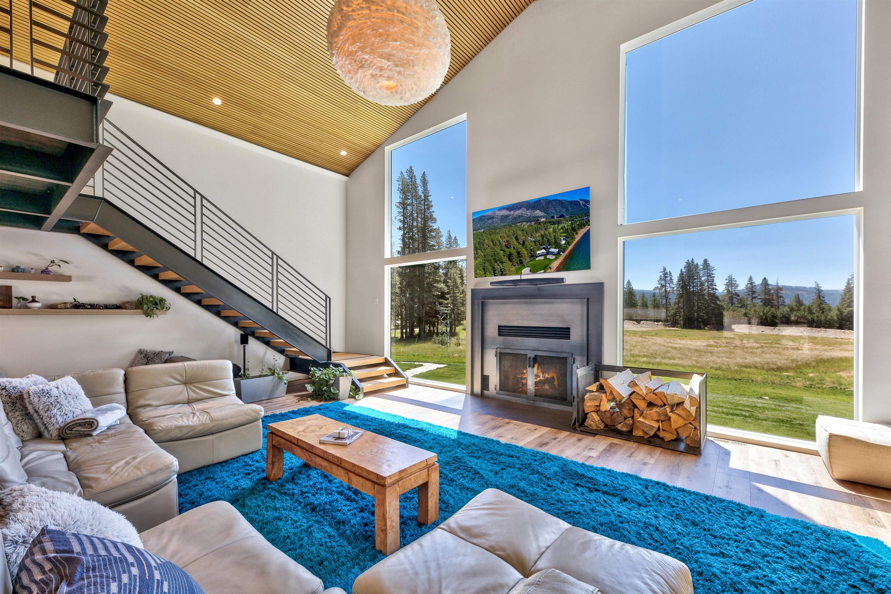 804 Fiberboard Road Sierraville, CA 96126 - Photo 6 of 28 a living room with furniture and a fireplace