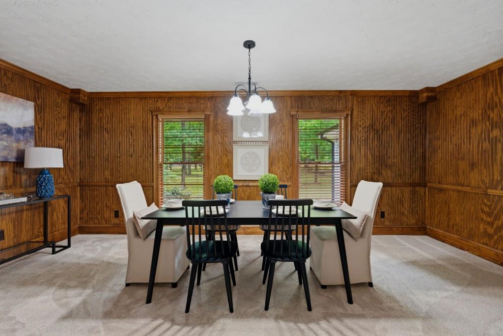 542 Knox Chapel Road Social Circle, GA 30025 - Photo 14 of 52 a view of a dining room with furniture window and outside view