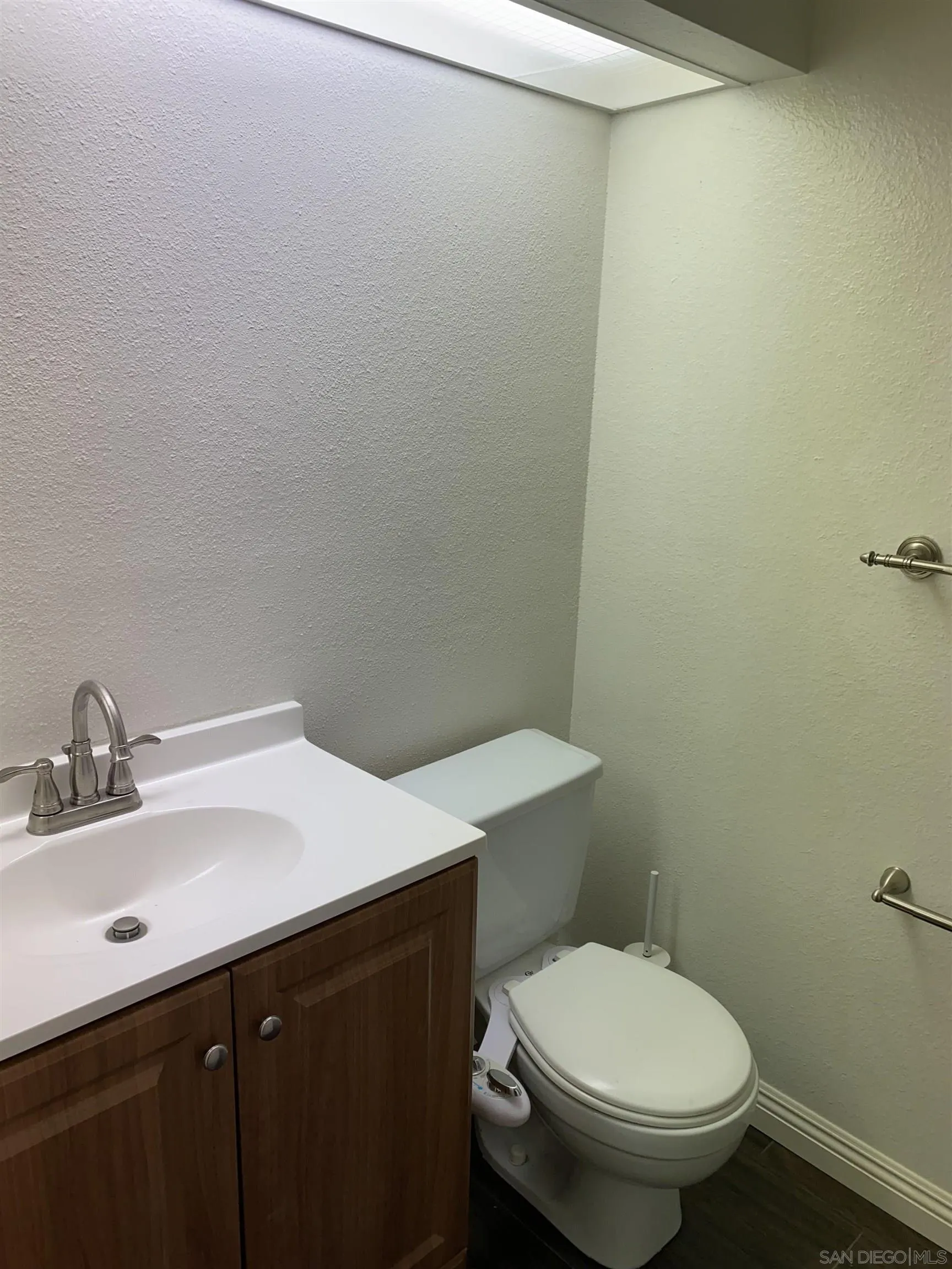 514 Jamacha Road, Unit 24J El Cajon, CA 92019 - Photo 13 of 32 a bathroom with a sink and a toilet