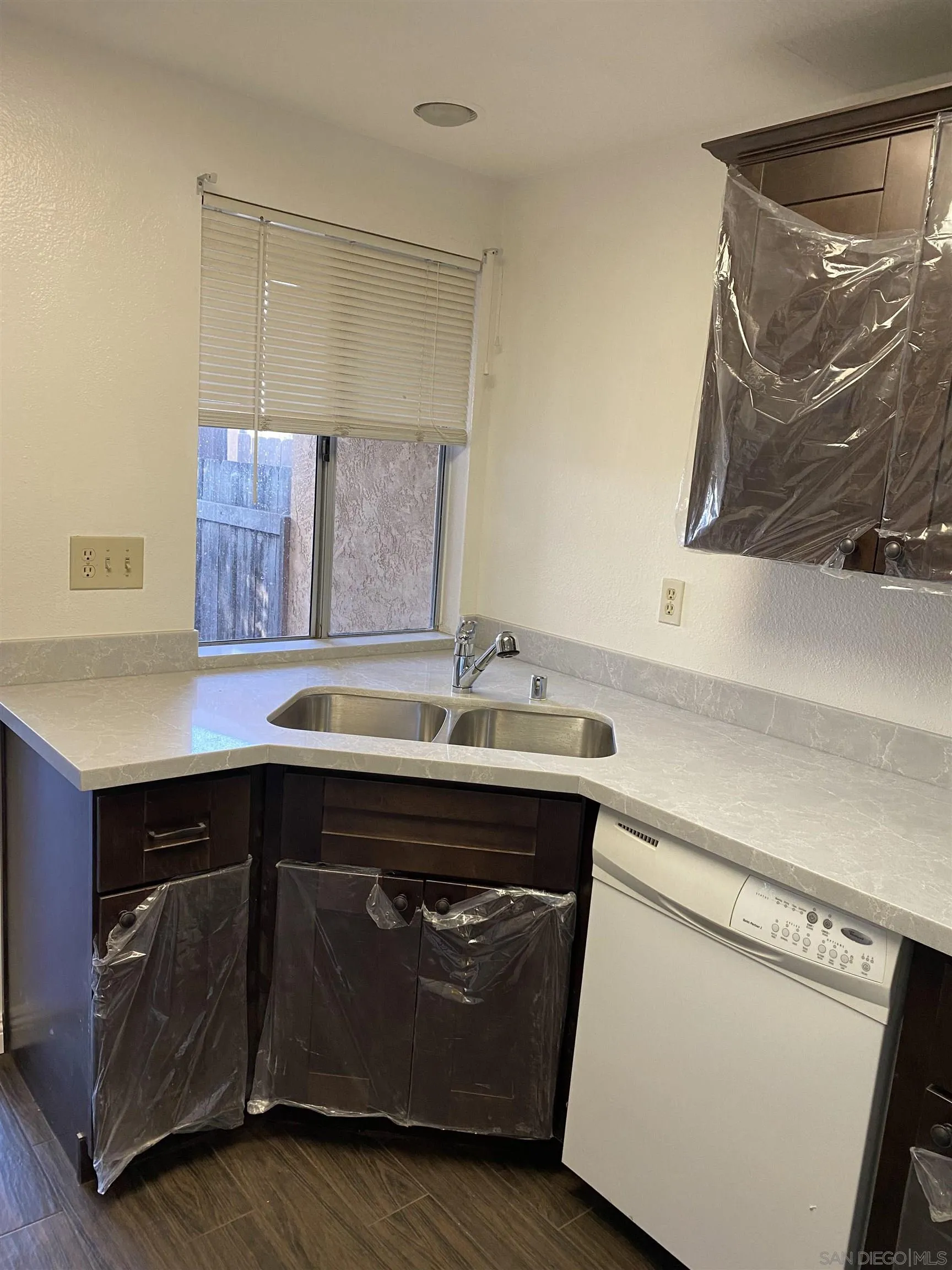514 Jamacha Road, Unit 24J El Cajon, CA 92019 - Photo 10 of 32 a kitchen with a sink and a stove top oven