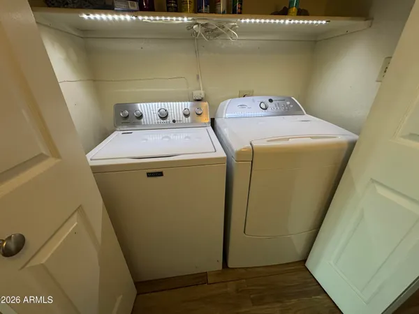 a utility room with dryer and washer