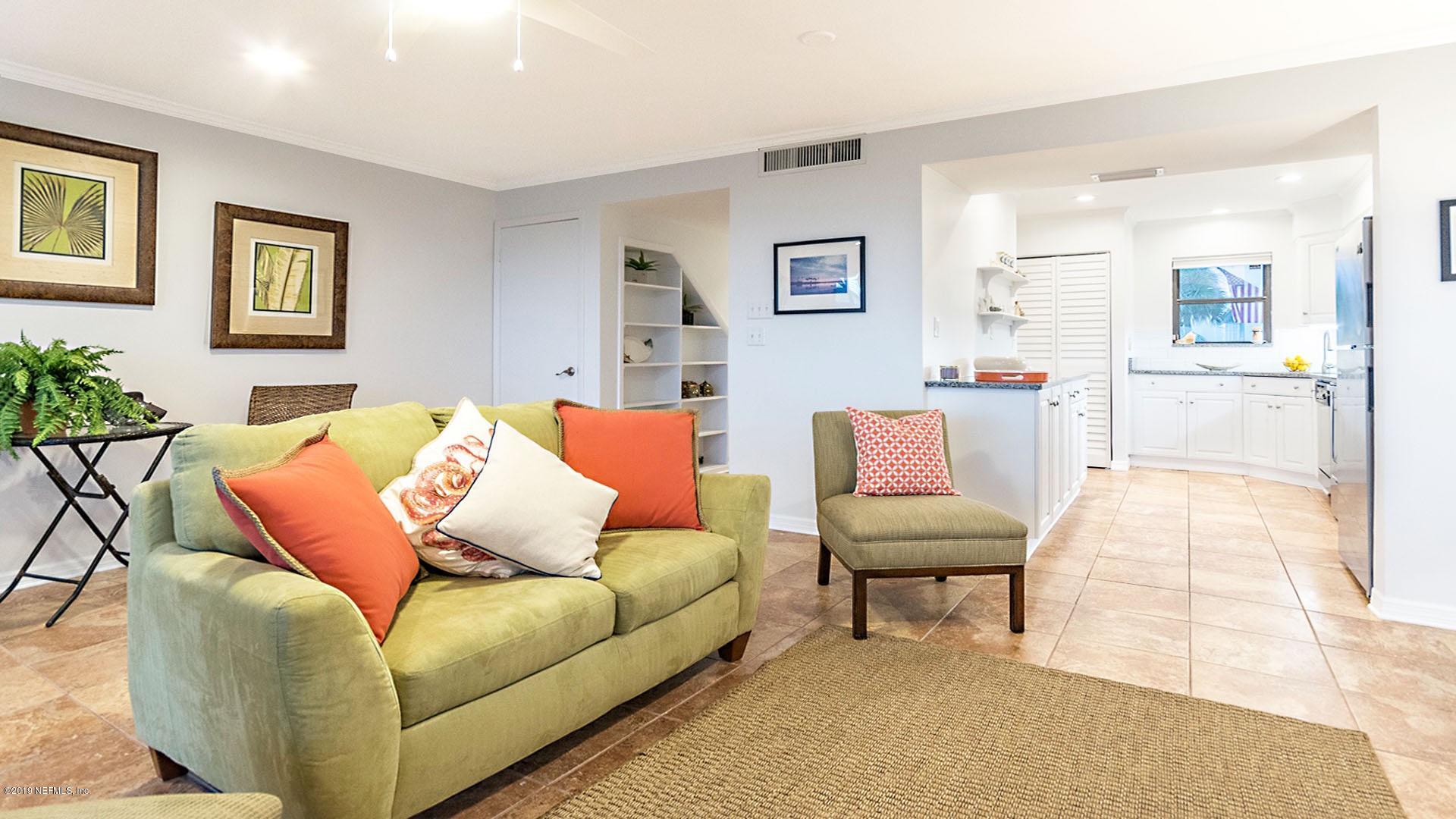 2233 Seminole Road, Unit 15 Atlantic Beach, FL 32233 - Photo 11 of 48 a living room with furniture and a couch