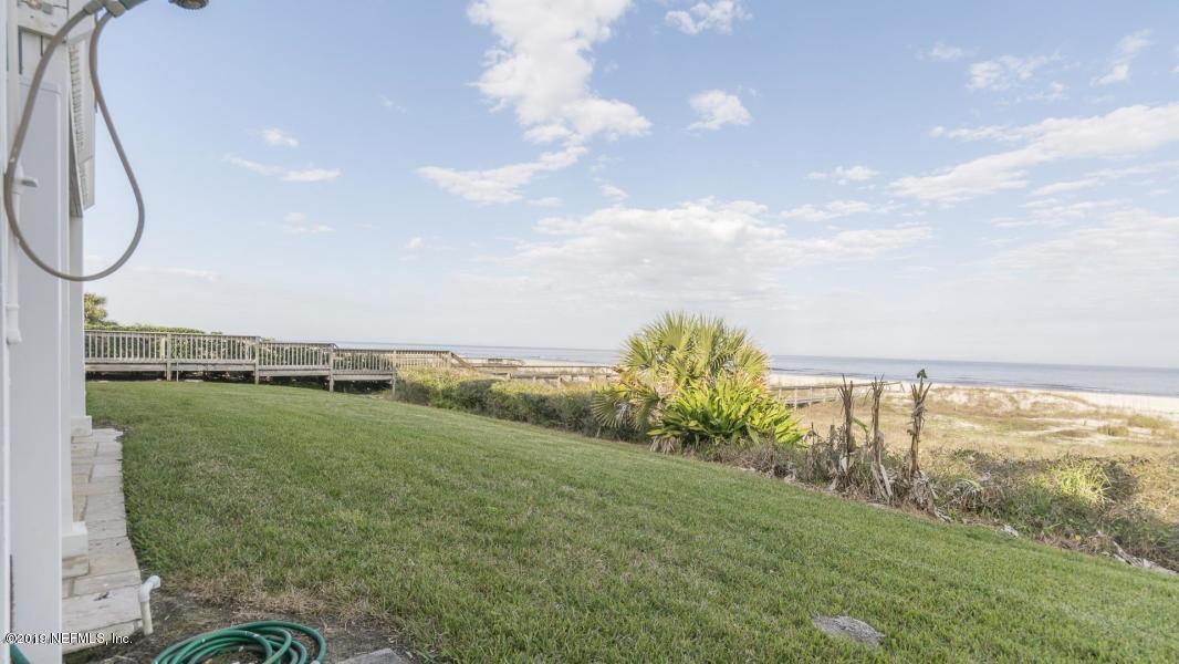 2233 Seminole Road, Unit 15 Atlantic Beach, FL 32233 - Photo 31 of 48 a view of a swimming pool with a yard