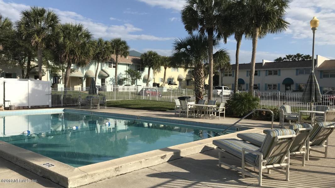 2233 Seminole Road, Unit 15 Atlantic Beach, FL 32233 - Photo 34 of 48 a view of yard with swimming pool and outdoor seating